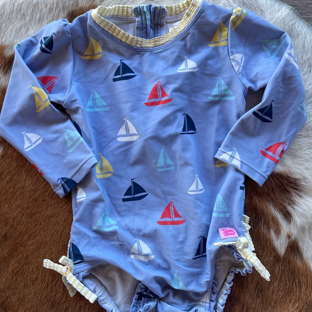 Ruffle Butts Long-Sleeve One-Piece Swimsuit in Light Blue with Sailboat Print